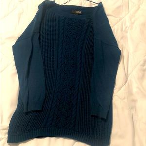 Turquoise Sweater with design overlay